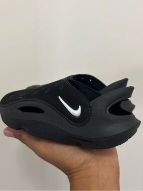 Nike Kids Black Slip-On Sandal with White Swoosh Accent